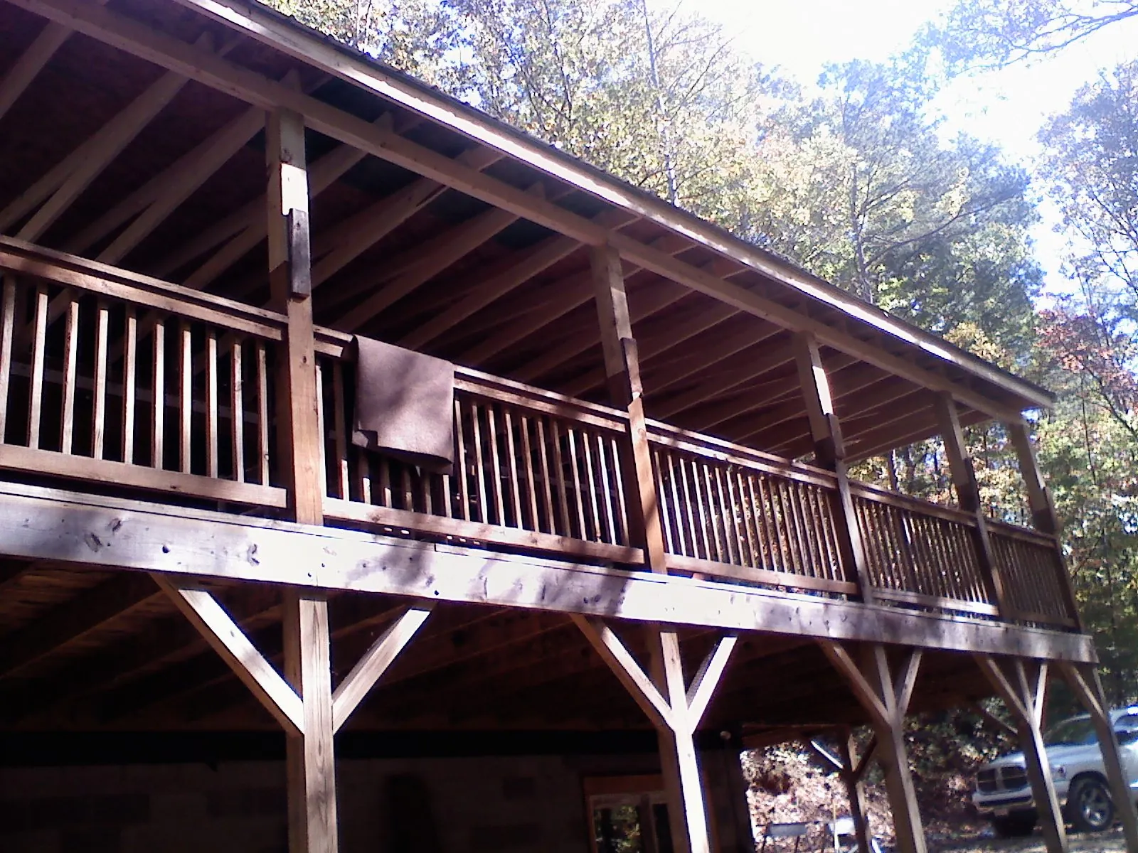 Timber framing under a new elevated porch and deck — Roof Leak Repair in Swisher by Roofing Brothers